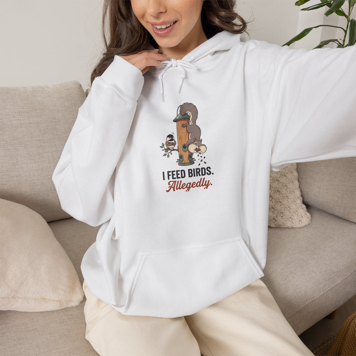 Hoodie with funny 'I Feed Birds. Allegedly.' design of a squirrel raiding a bird feeder while a chickadee glares