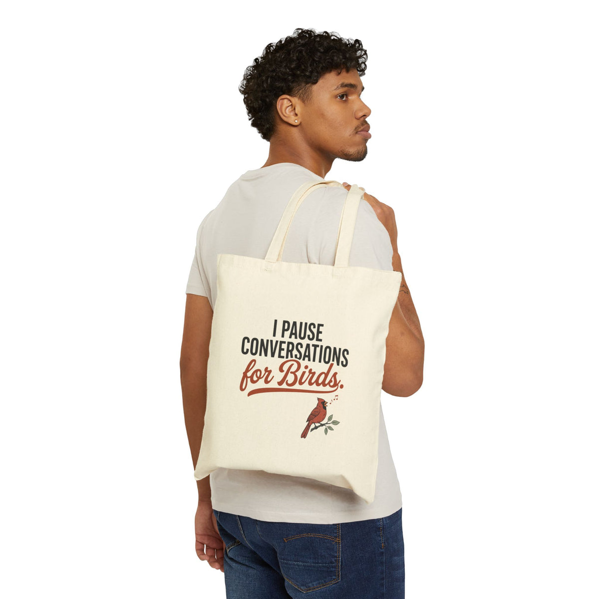 Canvas tote bag with 'I Pause Conversations for Birds' singing cardinal design