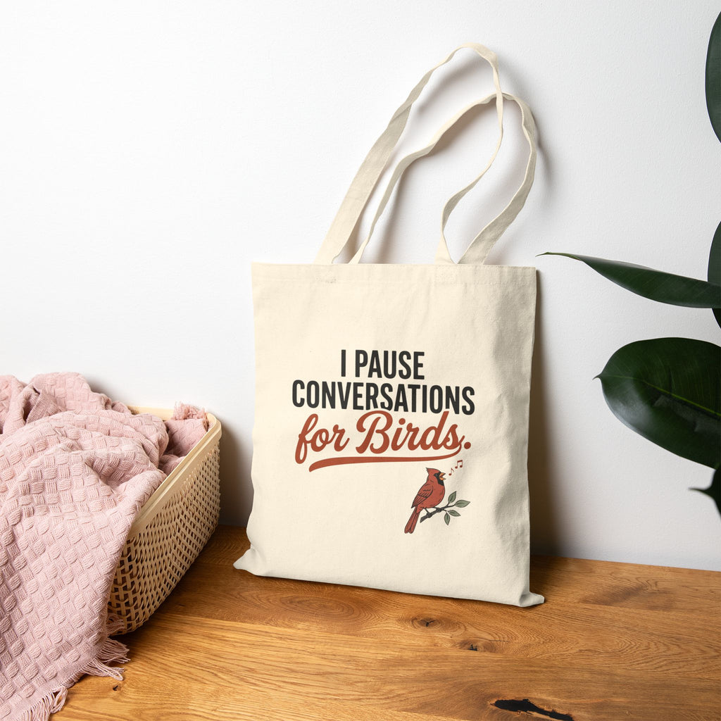 Canvas tote bag with 'I Pause Conversations for Birds' singing cardinal design