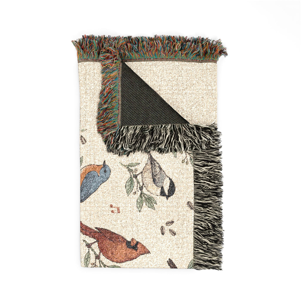 Woven throw blanket with vintage songbird pattern of chickadees, cardinals, bluebirds and robins