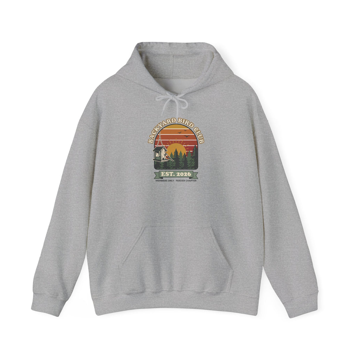 Hoodie with retro 'Backyard Bird Club Est. 2026' badge design featuring a sunset, pine trees and a chickadee at a bird feeder