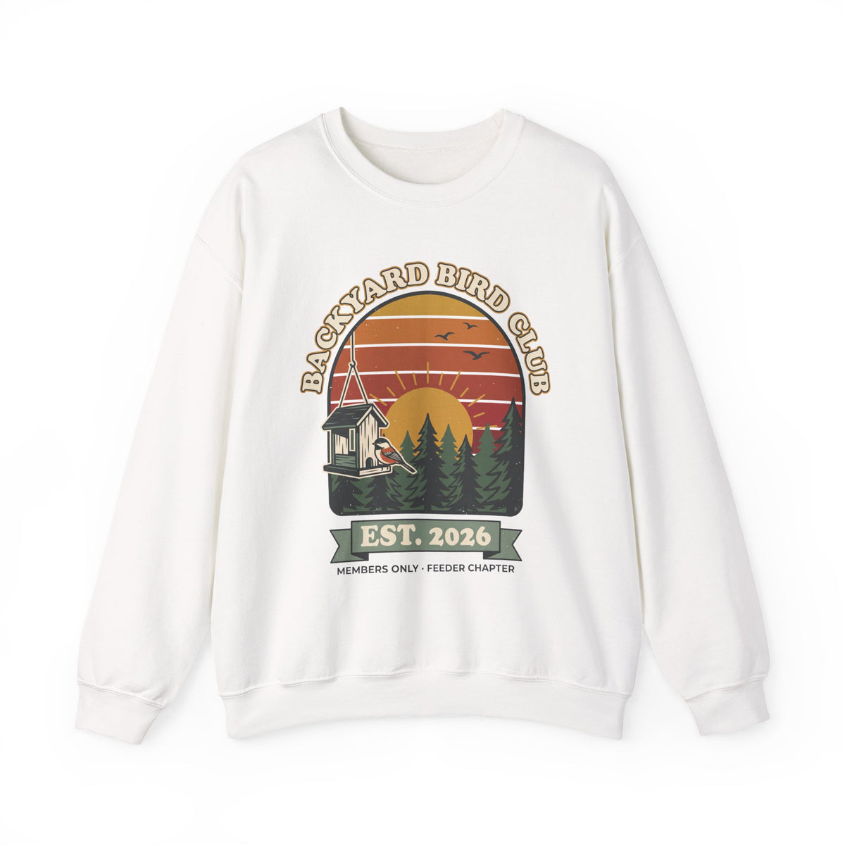 Crewneck sweatshirt with retro 'Backyard Bird Club Est. 2026' badge design featuring a sunset, pine trees and a chickadee at a bird feeder
