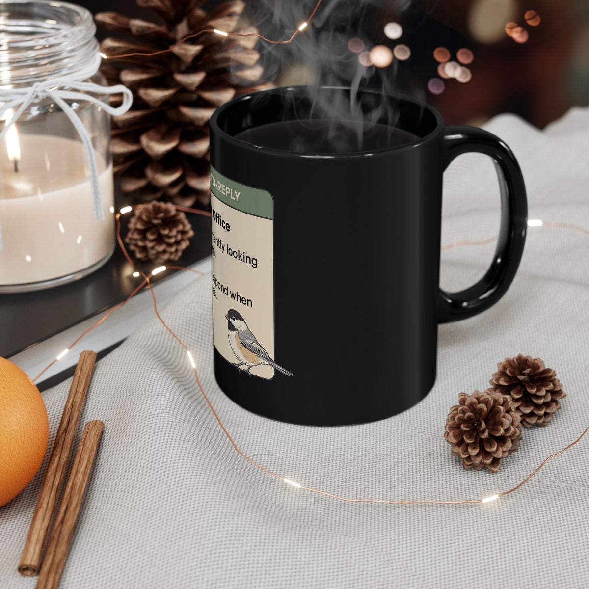 Black 11 oz mug with funny 'Out of Office: I'm currently looking at a bird' design and chickadee