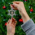 Pewter snowflake Christmas ornament with 'Bird Nerd' chickadee design