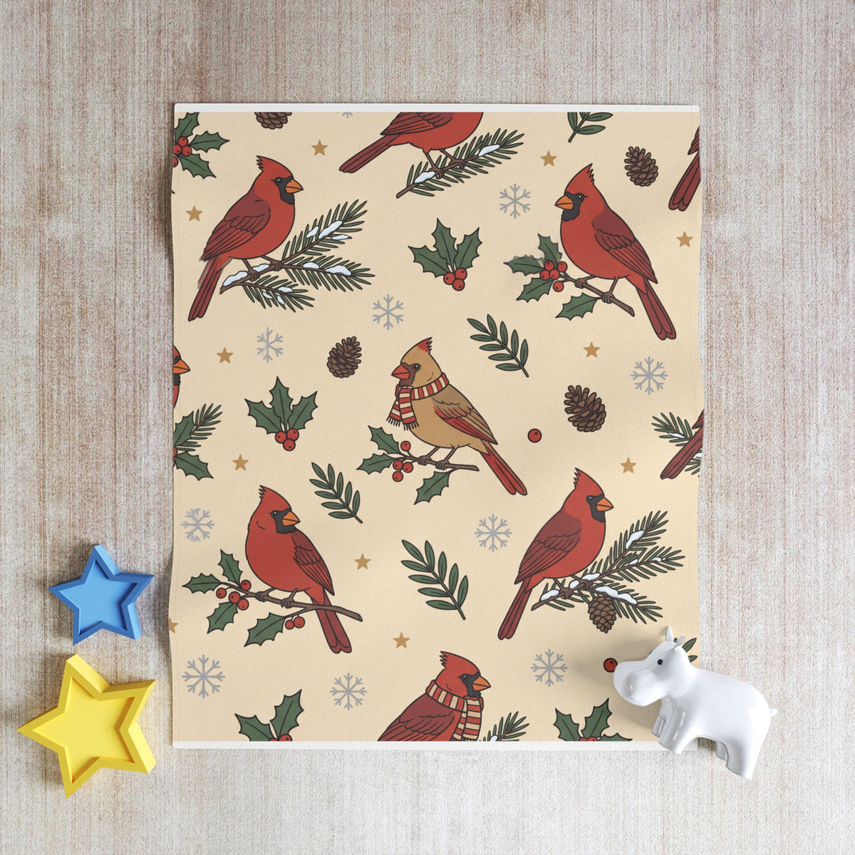 Christmas throw blanket with cardinals, holly and evergreen pattern